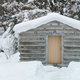 Illustration for article titled This Cozy Log Cabin in the Swiss Alps Is Completely Made of Concrete